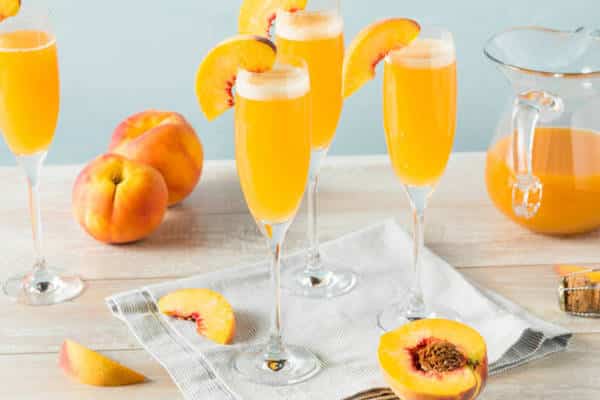 Sweet Bubbly Peach Bellini Mimosa with Champagne