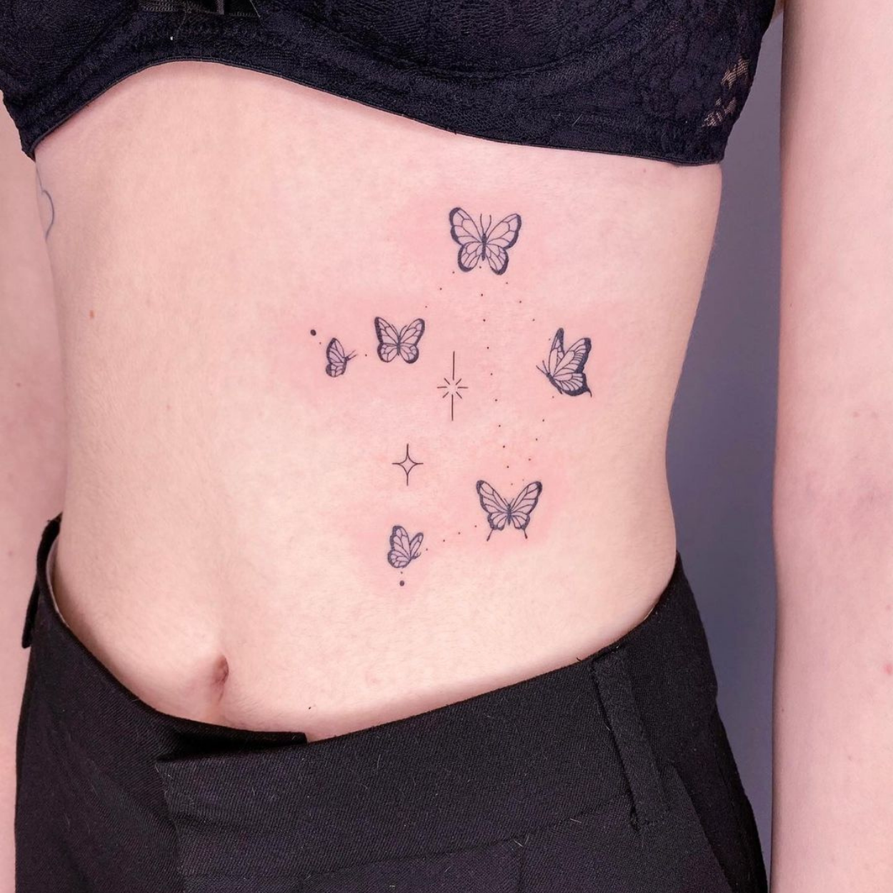 tatuagem de borboletas pequenas