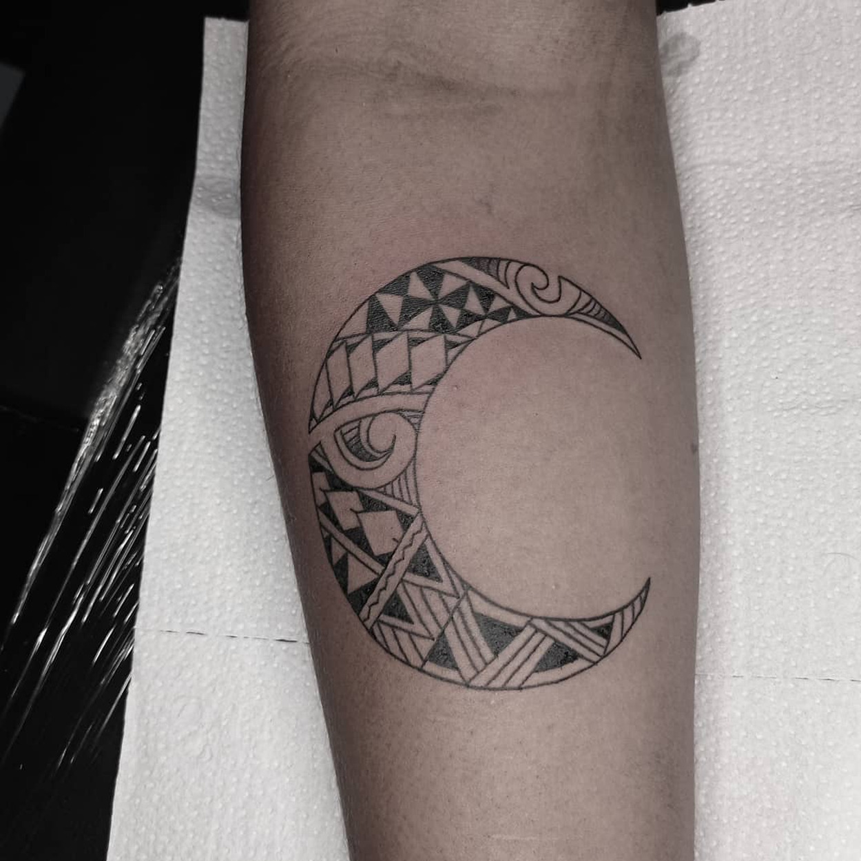 tatuagem maori de lua