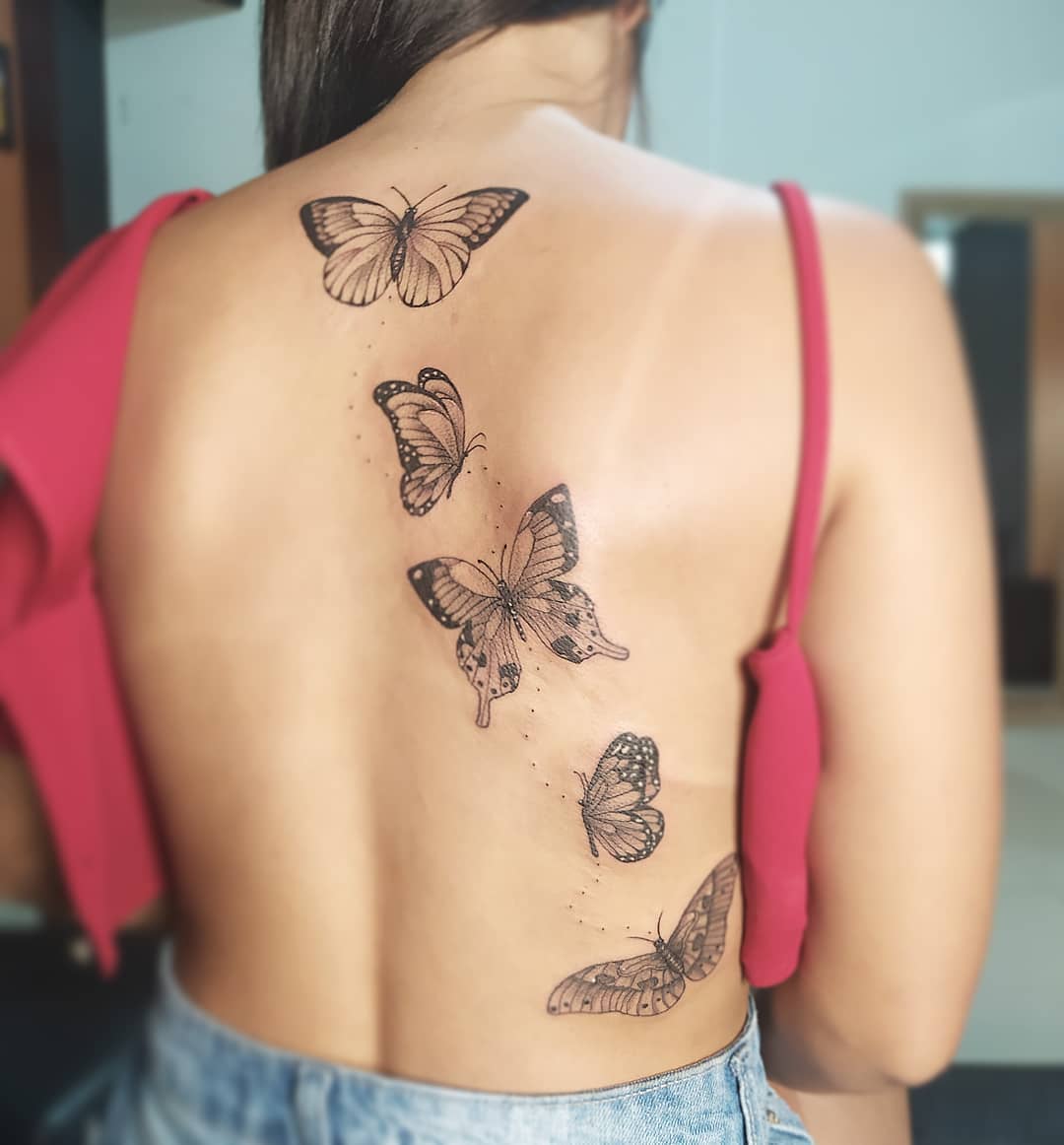 tatuagem feminina nas costas 19