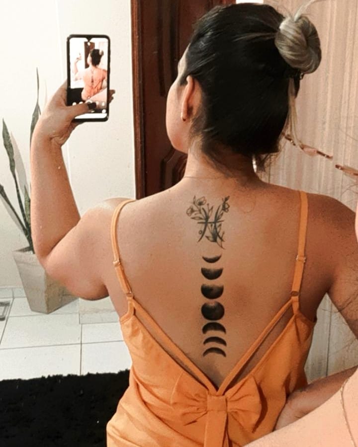 tatuagem feminina nas costas 28