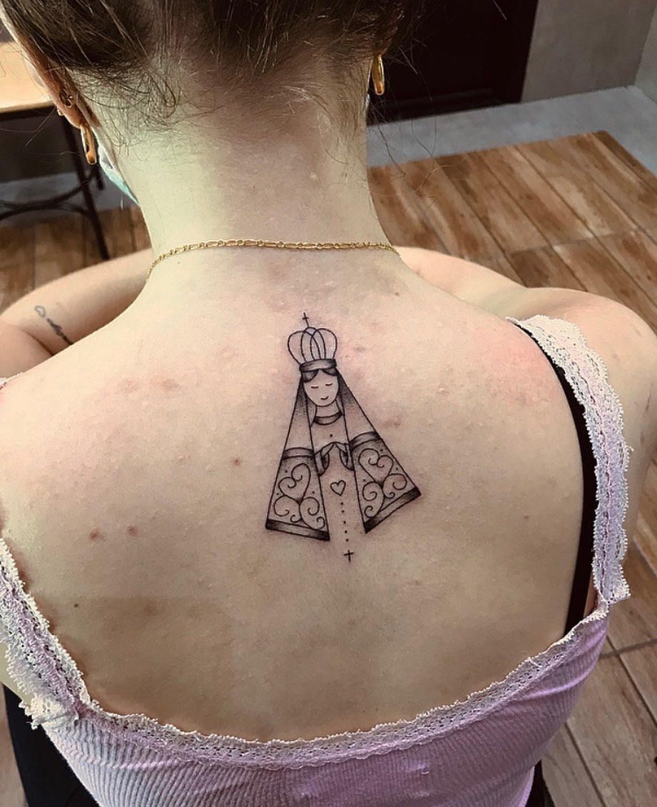 tatuagem feminina nas costas 38